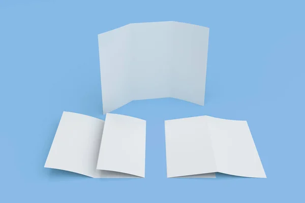 Boş beyaz üç katlı broşür mockup mavi zemin üzerine