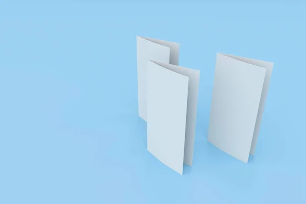 空白的白色两折小册子样机在蓝色背景上 — 图库照片