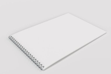 Beyaz arka plan üzerinde beyaz boş defter metal spiral ile bağlı