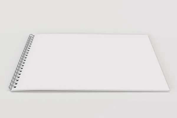 Caderno branco em branco com espiral de metal encadernado no fundo branco — Fotografia de Stock