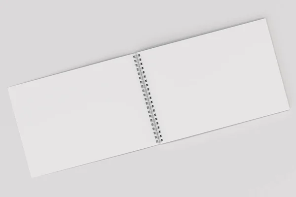 Notebook branco em branco aberto com espiral de metal encadernado no backg branco — Fotografia de Stock