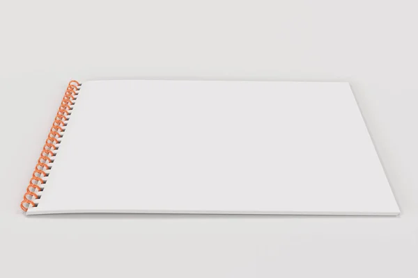 Lege witte laptop met metalen spiraal gebonden op witte achtergrond — Stockfoto