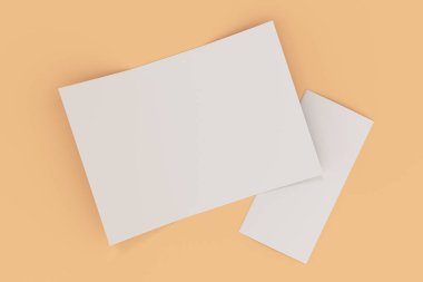 Turuncu zemin üzerine boş beyaz açık üç katlı broşür mockup