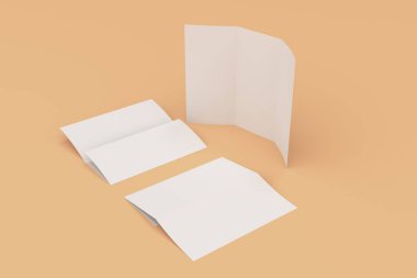 Boş beyaz üç katlı broşür mockup turuncu zemin üzerine
