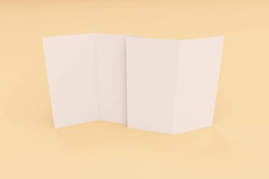 Boş beyaz iki kat broşürü mockup turuncu zemin üzerine