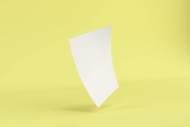 Boş beyaz bükümlü el ilanı mockup Sarı zemin üzerine