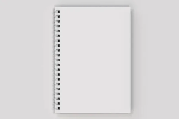 关闭的笔记本螺旋装订在白色背景上 — 图库照片