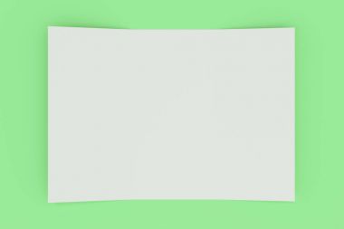 Yeşil zemin üzerine boş beyaz açık üç katlı broşür mockup