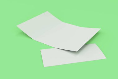 Yeşil zemin üzerine boş beyaz açık üç katlı broşür mockup