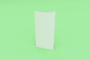 Boş beyaz iki kat broşürü mockup yeşil zemin üzerine