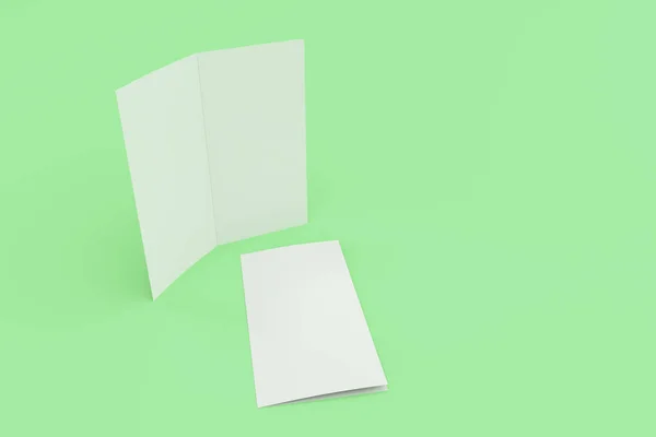 Bianco bianco due pieghe brochure mockup su sfondo verde — Foto Stock