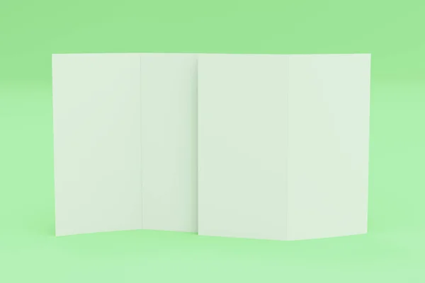 Blank white two fold brochure mockup on green background — Stock Photo, Image