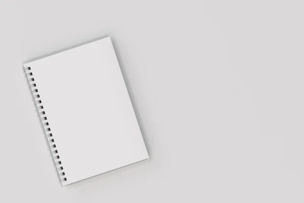 Chiuso notebook spirale rilegato su sfondo bianco — Foto Stock