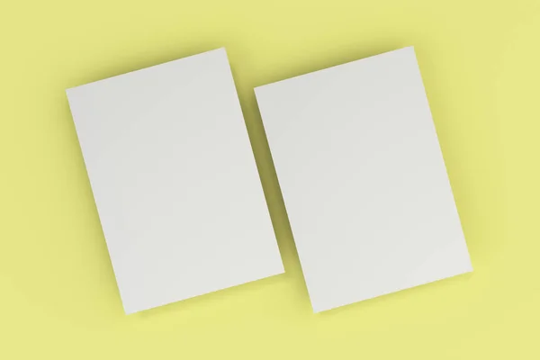 Folleto blanco en blanco maqueta sobre fondo amarillo — Foto de Stock