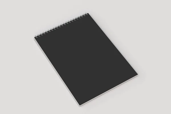 Caderno preto em branco com espiral de metal encadernado no fundo branco — Fotografia de Stock