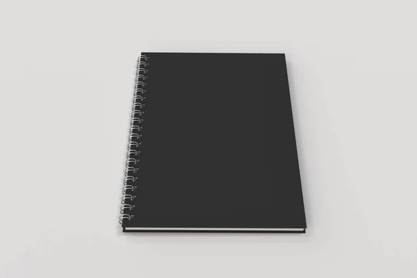 Chiuso notebook spirale rilegato su sfondo bianco — Foto Stock
