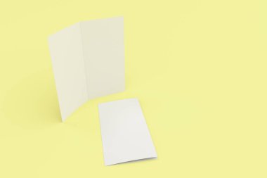 Boş beyaz iki kat broşürü mockup Sarı zemin üzerine