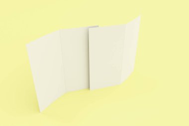 Boş beyaz iki kat broşürü mockup Sarı zemin üzerine