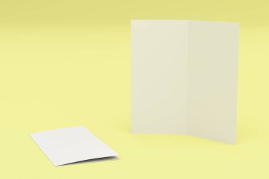 Boş beyaz iki kat broşürü mockup Sarı zemin üzerine