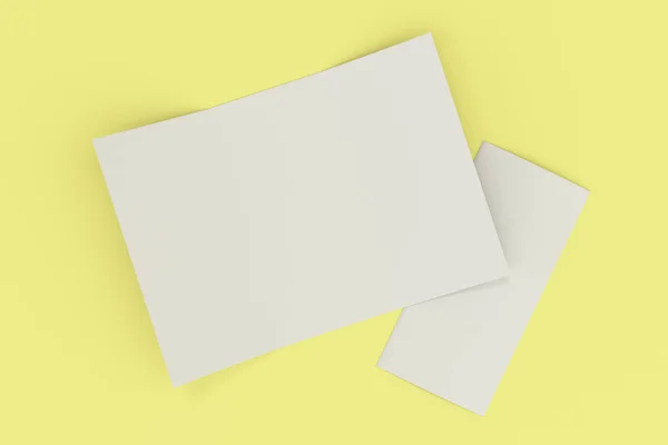 Leere weiße offene dreifaltige Broschüre-Attrappe auf gelbem Hintergrund — Stockfoto