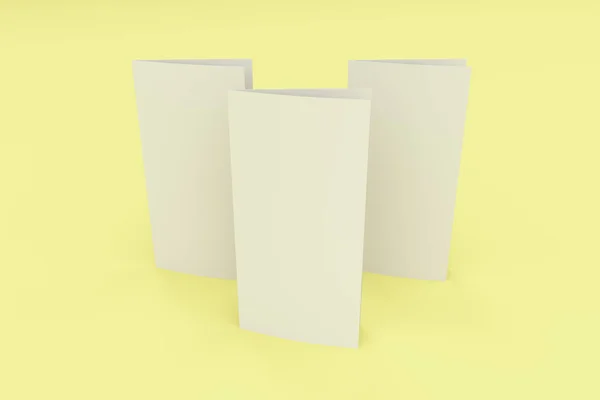 Branco em branco duas dobras brochura mockup no fundo amarelo — Fotografia de Stock