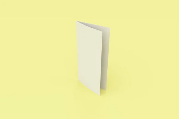 Blank white two fold brochure mockup on yellow background — Stock Photo, Image