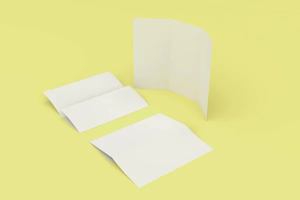 Branco em branco três vezes brochura mockup no fundo amarelo — Fotografia de Stock