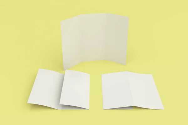 Puste białe trzy krotnie Broszura makieta na żółtym tle — Zdjęcie stockowe