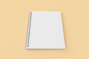 Turuncu zemin üzerine bağlı kapalı defter spiral