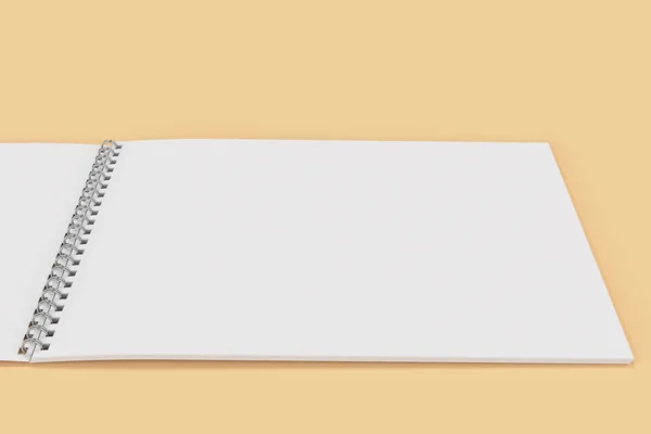 Aperto notebook bianco bianco con rilegato a spirale metallica sul retro arancione — Foto Stock