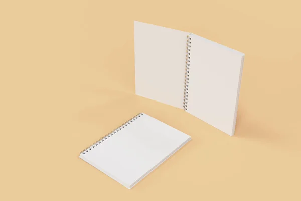 Két jegyzetfüzet, spirál kötött narancssárga háttér — Stock Fotó
