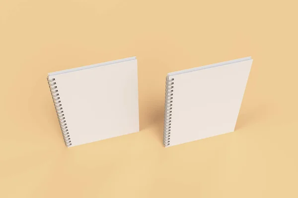 Dois cadernos com encadernação em espiral em fundo laranja — Fotografia de Stock