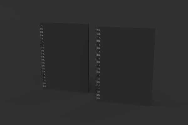 黒い背景にバインドされたスパイラル ノートを 2 冊 — ストック写真