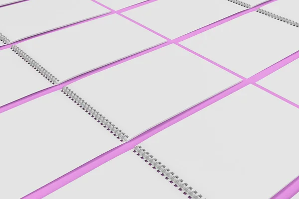Lege witte laptop met metalen spiraal gebonden op violet pagina — Stockfoto