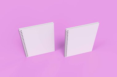 Menekşe arka plan üzerinde iki defter spiral ile bağlı