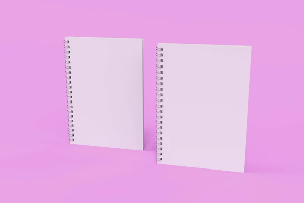 Dois cadernos com espiral encadernada no fundo violeta — Fotografia de Stock