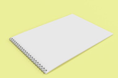 Boş beyaz defter ile metal sarmal sarı adam bağlı