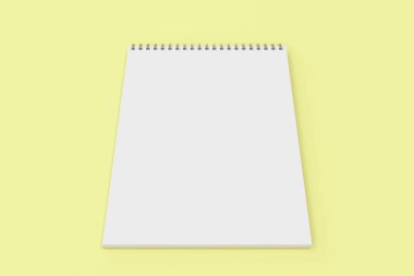 Boş beyaz defter ile metal sarmal sarı adam bağlı