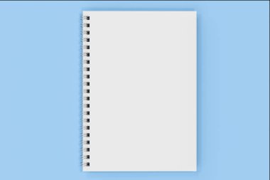 Mavi arka plan üzerinde bağlı kapalı defter spiral