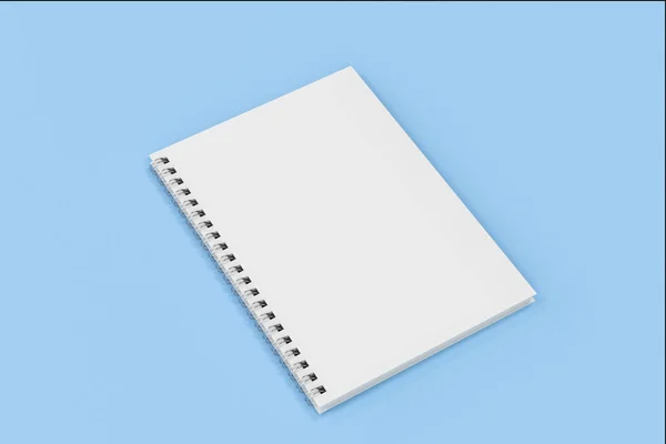 Mavi arka plan üzerinde bağlı kapalı defter spiral