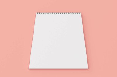 Kırmızı zemin üzerine beyaz boş defter metal spiral ile bağlı