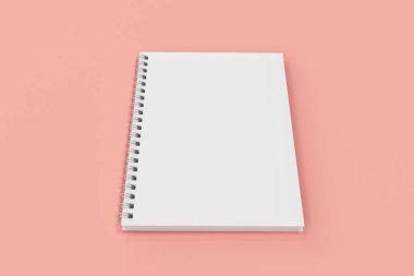 Kapalı defter spiral kırmızı zemin üzerine bağlı