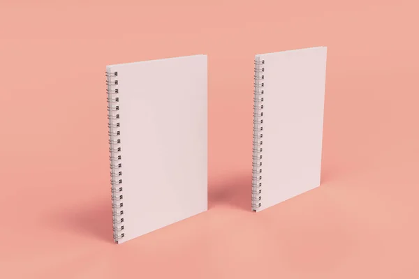 Dos cuadernos con espiral encuadernada sobre fondo rojo — Foto de Stock