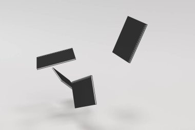 Beyaz arka plan üzerinde dört defter spiral ile bağlı