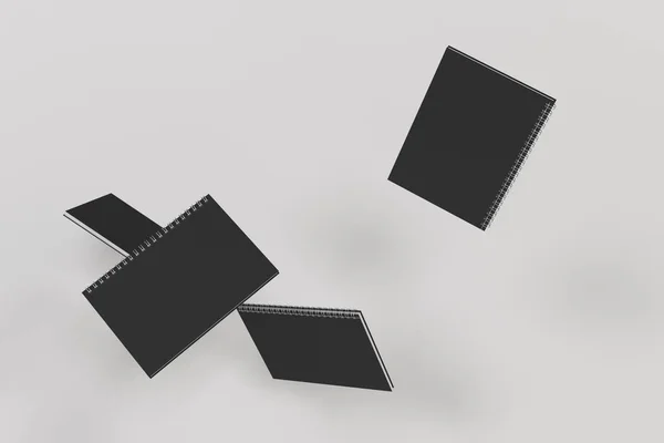 Quatro cadernos com encadernação em espiral em fundo branco — Fotografia de Stock