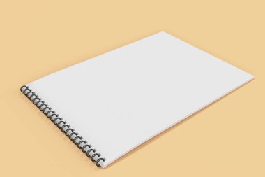 Portakal adam boş beyaz defter siyah sarmal ile bağlı