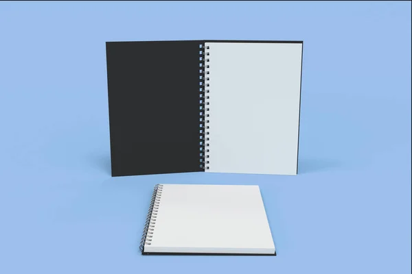 Dos cuadernos con espiral encuadernada sobre fondo azul — Foto de Stock