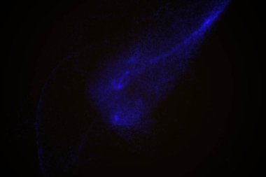 Arka plan mavi parlak parçacıkların yapılmış