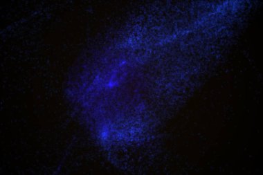 Arka plan mavi parlak parçacıkların yapılmış