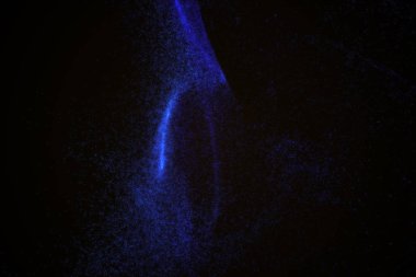 Arka plan mavi parlak parçacıkların yapılmış